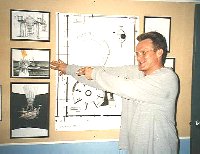 Brian points to a picture